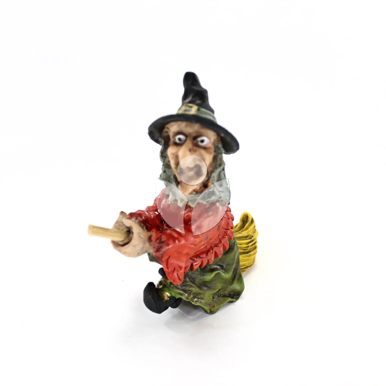 Figura brujita de resina volando