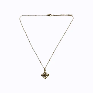 colgante acero nudo de brujas dorado