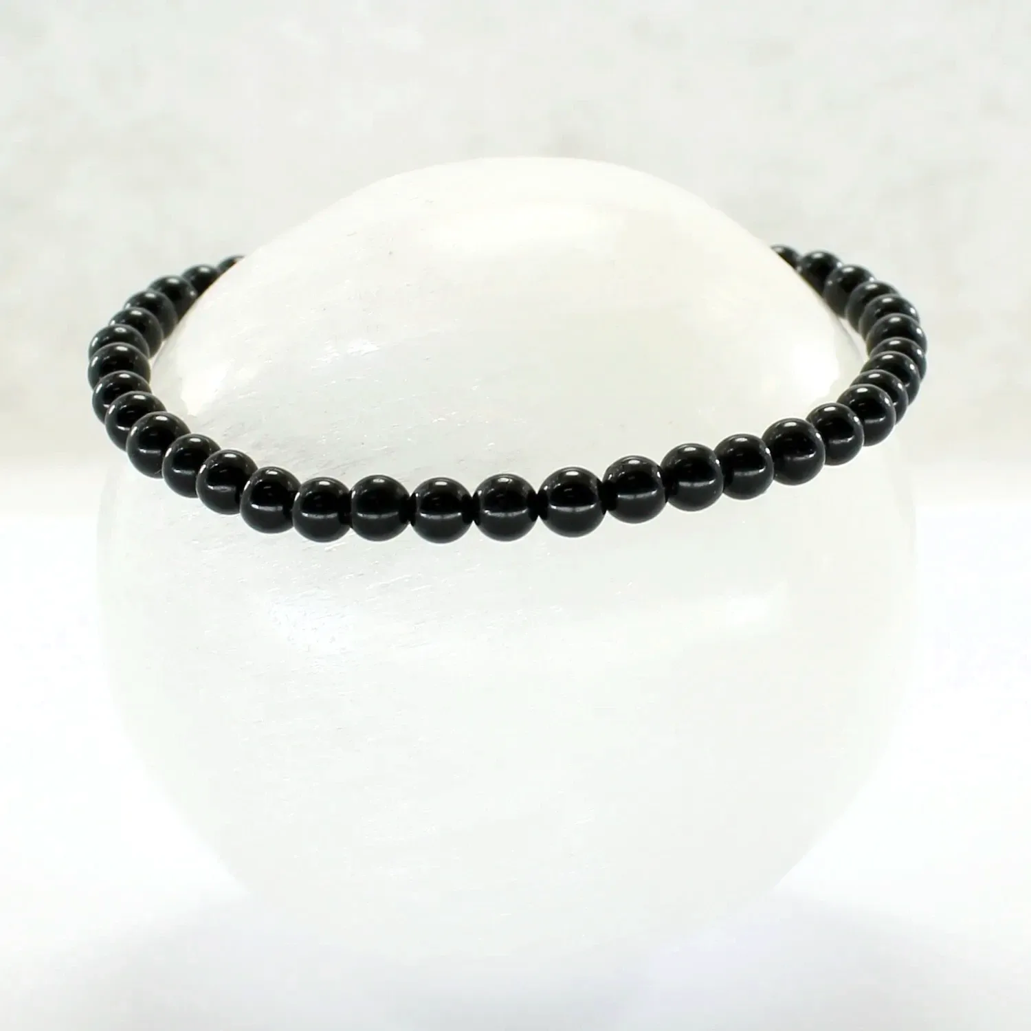 Pulsera elástica de turmalina negra