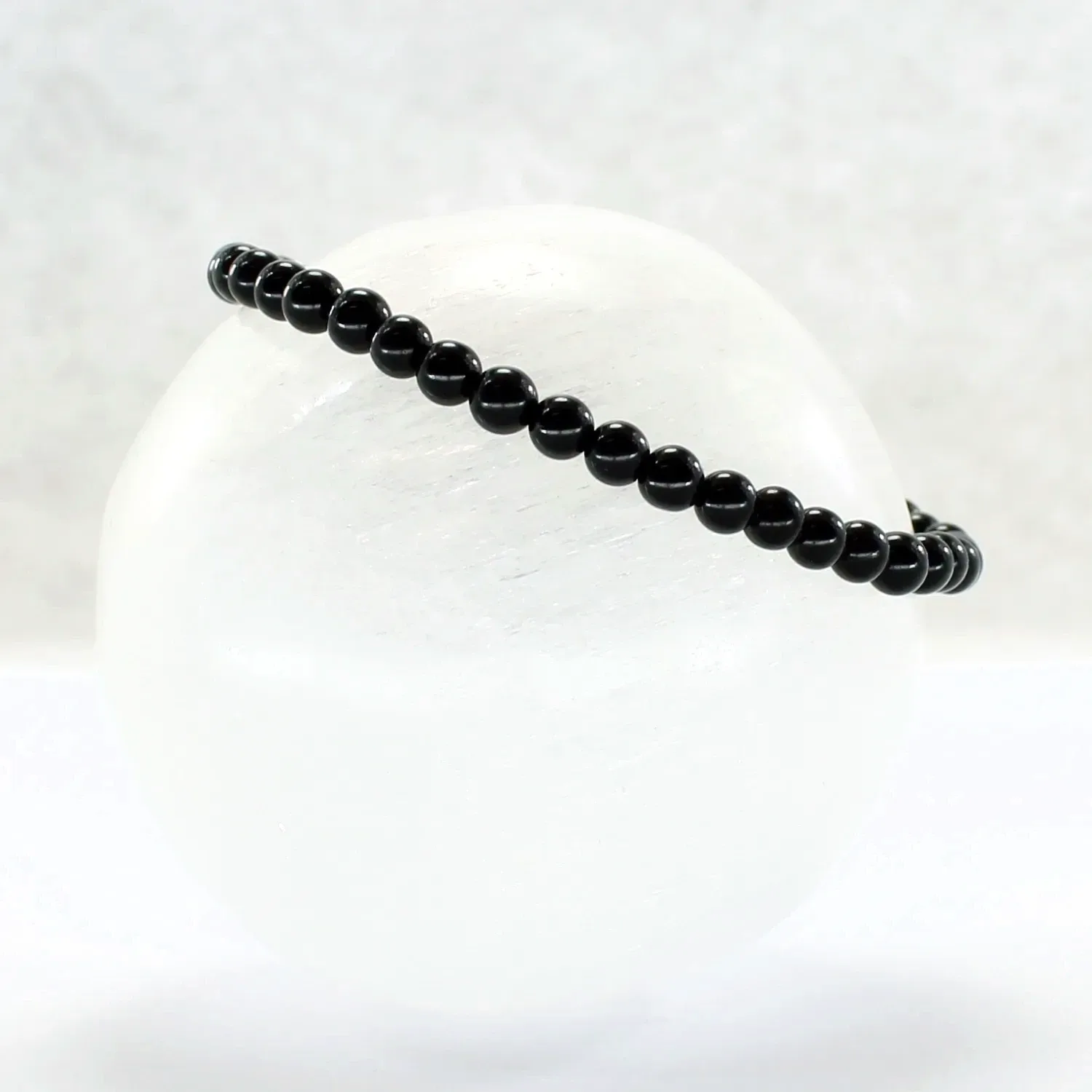 Pulsera elástica de turmalina negra